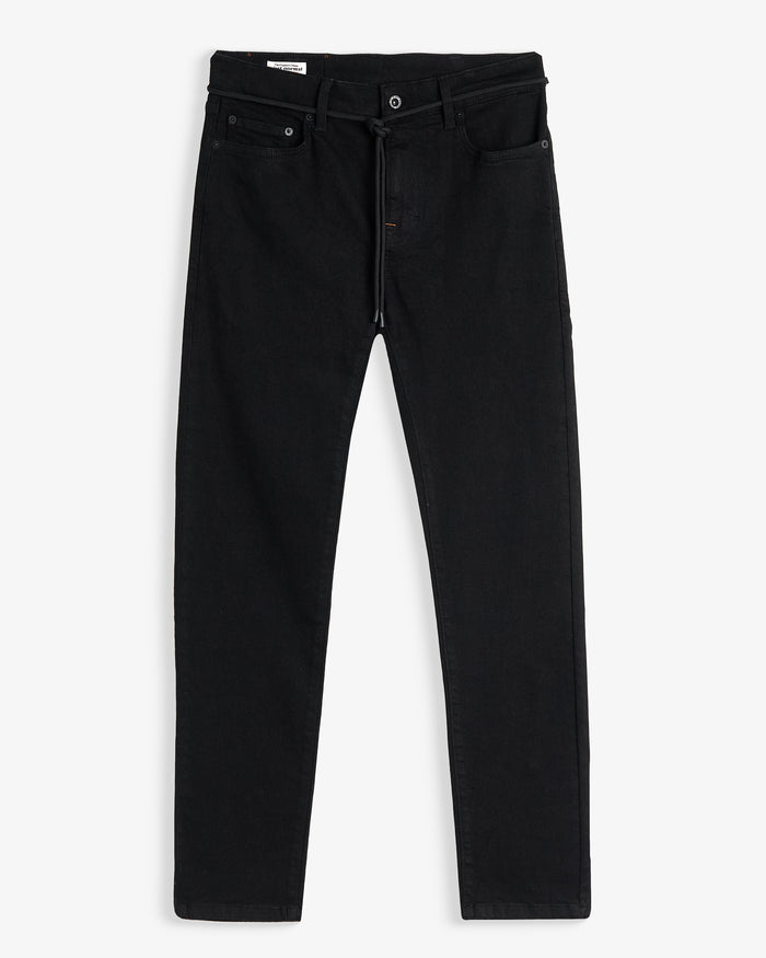 A front view of The Jeans Slim Fit in Jet Black, laid flat on a white background. The image highlights the clean slim silhouette, five-pocket design, and zip fly with top button.