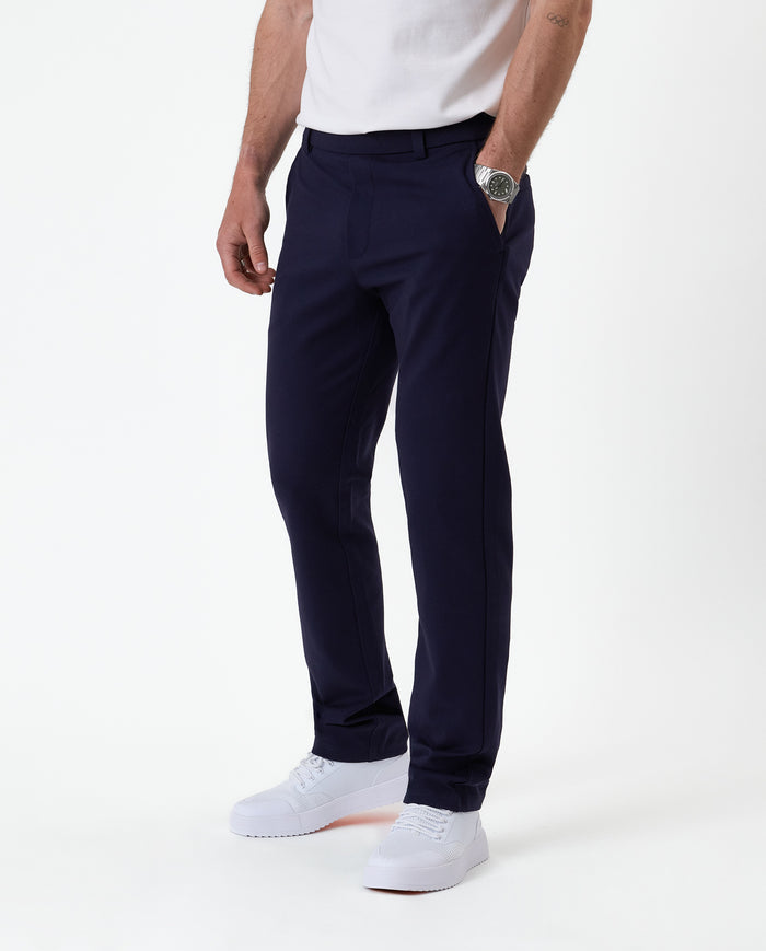 The Proper Pant Regular Fit in navy — side view showing the straight leg silhouette