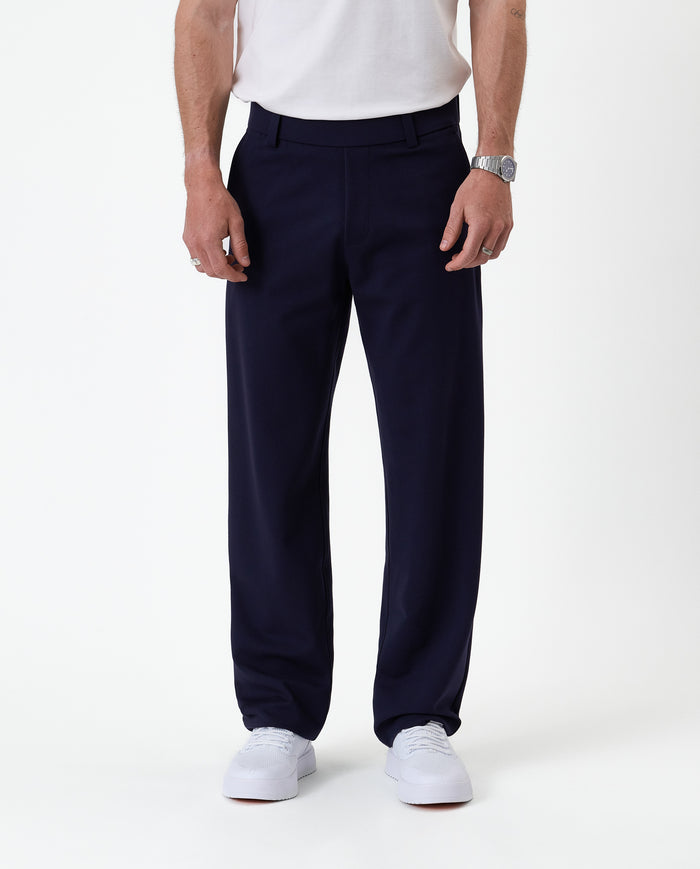 The Proper Pant Relaxed Straight Fit in navy — front view showing the straight leg silhouette