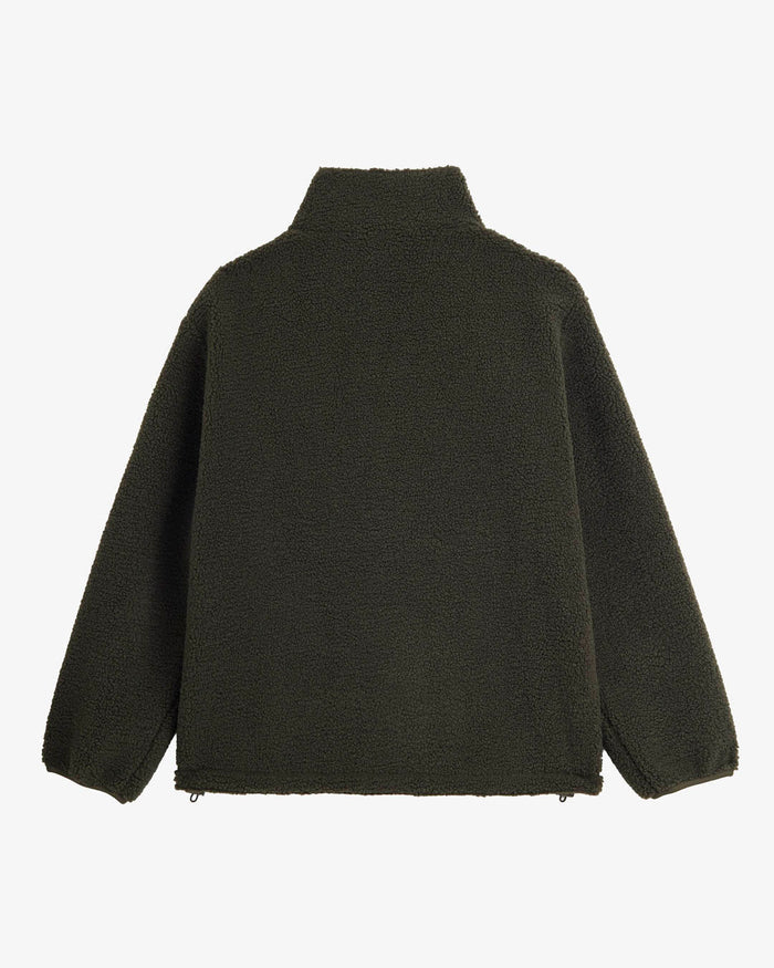 A back view of The Reversible Pile Jacket in forest green, laid flat on a white background. The image highlights the cozy pile fleece side and the adjustable cinch cord at the hem.