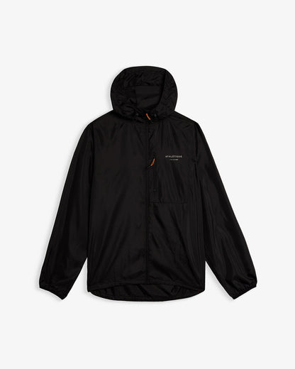 A front view of The Running Jacket in black, laid flat on a white background. The image highlights the hood, the front zipper with a contrast zipper puller, the front pocket for essentials, and the reflective ATHLÉTIQUE c'est normal branding on the chest.
