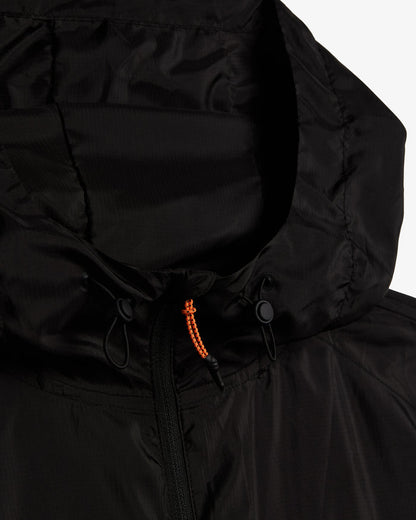 A close-up shot of the hood and neckline of The Running Jacket in black, highlighting the black drawstrings, YKK zipper, and the contrast orange zipper puller.