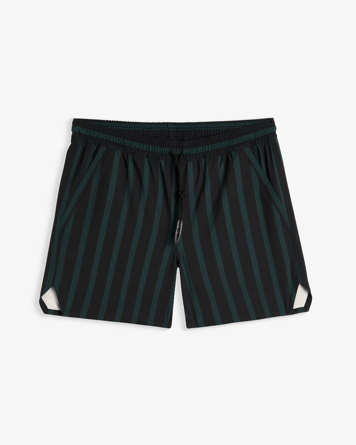 A front view of The Shorts in phantom stripe colorway, laid flat on a white background. The image highlights the elasticated waistband with a drawstring, side pockets, and notched hem.