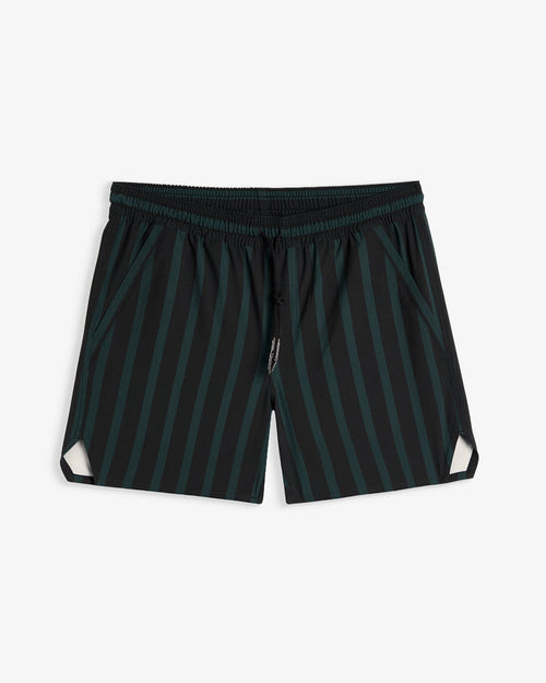 A front view of The Shorts in phantom stripe colorway, laid flat on a white background. The image highlights the elasticated waistband with a drawstring, side pockets, and notched hem.