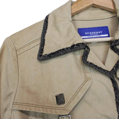 Burberry tan brown denim jacket with logo patch and visible stains, vintage style.