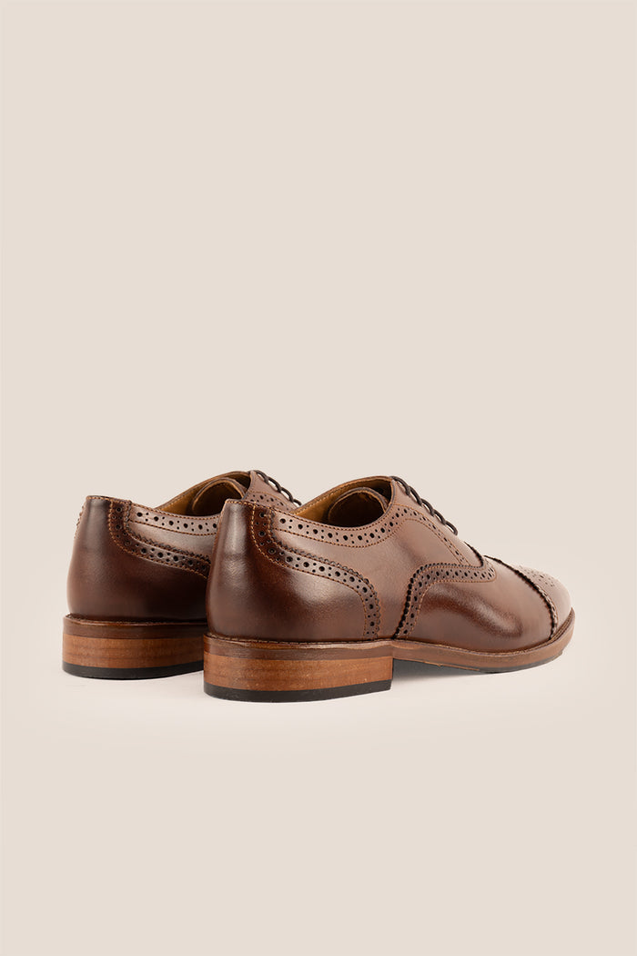 Westminster brown leather Oxford brogue shoes for men, featuring a five-eyelet lace-up and classic toecap detail for a polished formal look.