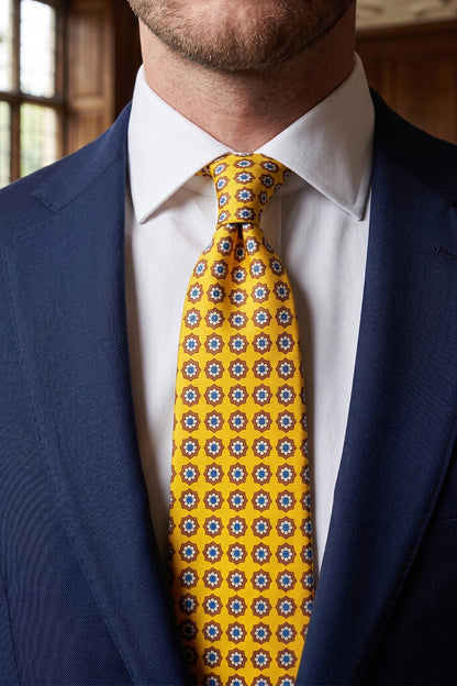 Yellow Floral Print Silk Tie with elegant design, adding sophistication and luxury to formal occasions.