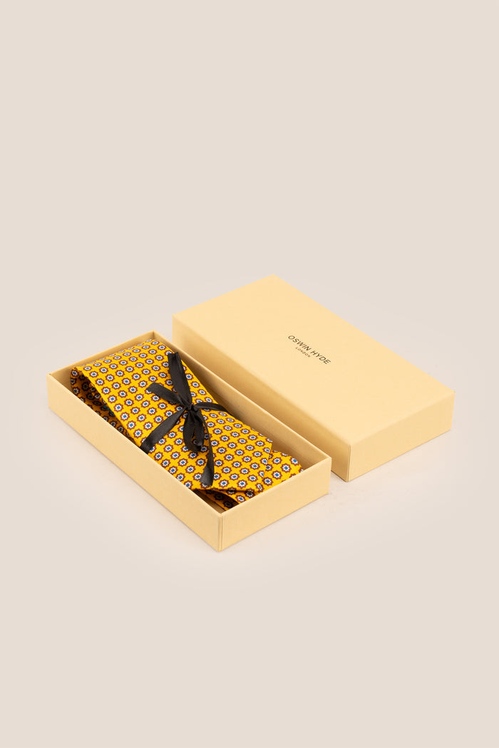 Yellow Floral Print Silk Tie with elegant design, adding sophistication and luxury to formal occasions.